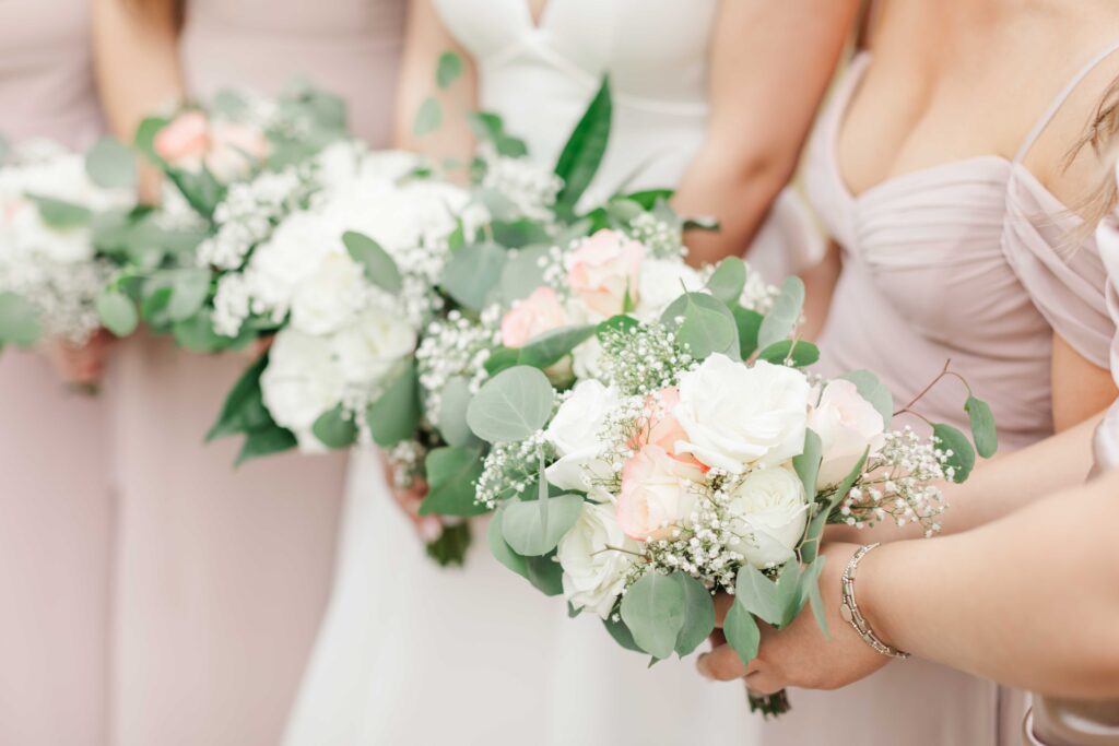 pink, white, and green florals on wedding day