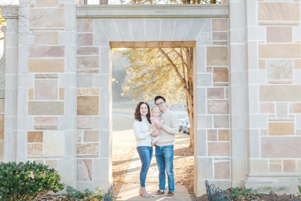 Nashville, TN family standing underneath a pretty entrance to Percy Warner Steps