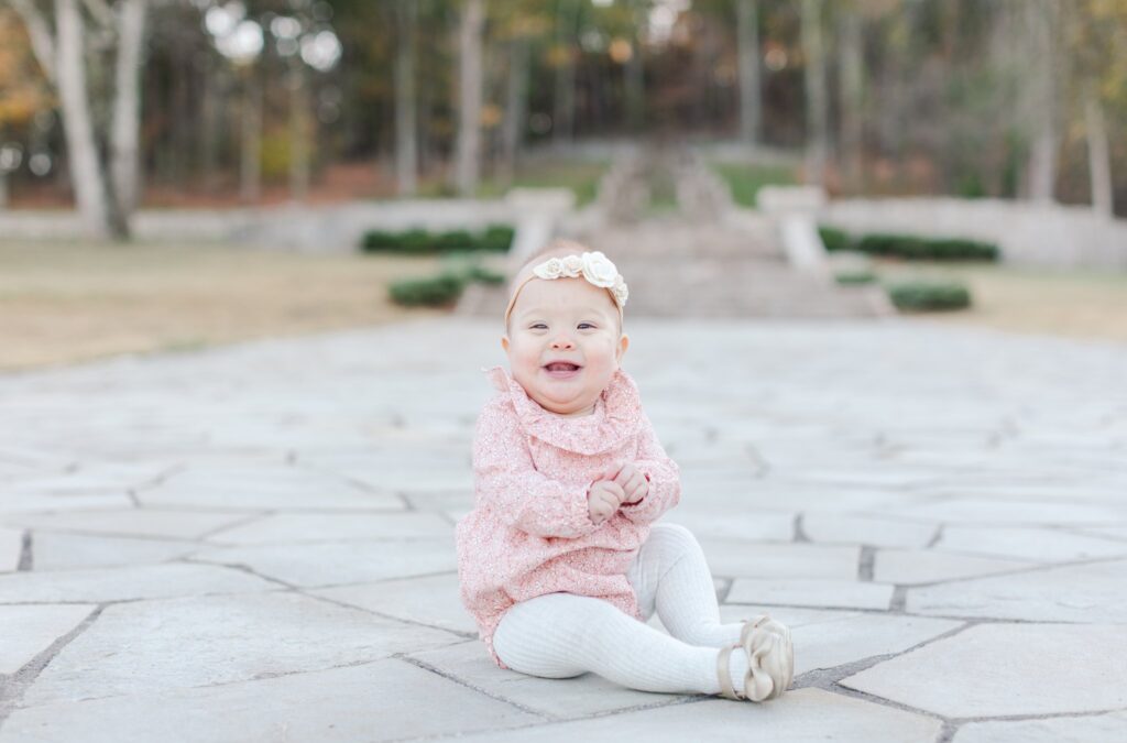 Toddler laughing and smiling at Percy Warner Steps in Nashville, TN