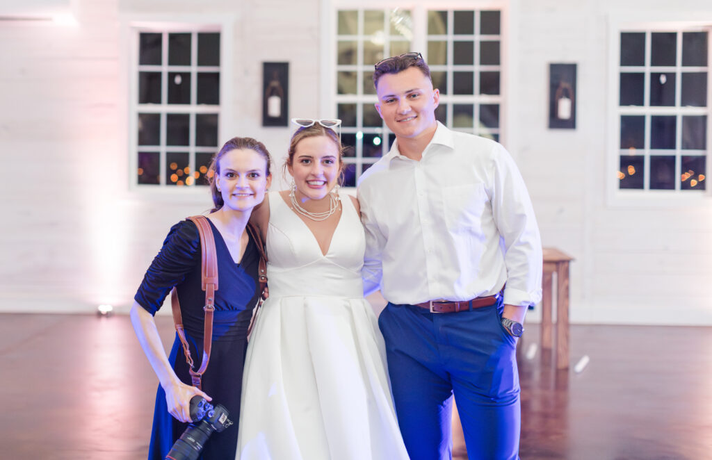 Jennifer Cooke Photography smiling with one of her couples on their wedding day! 