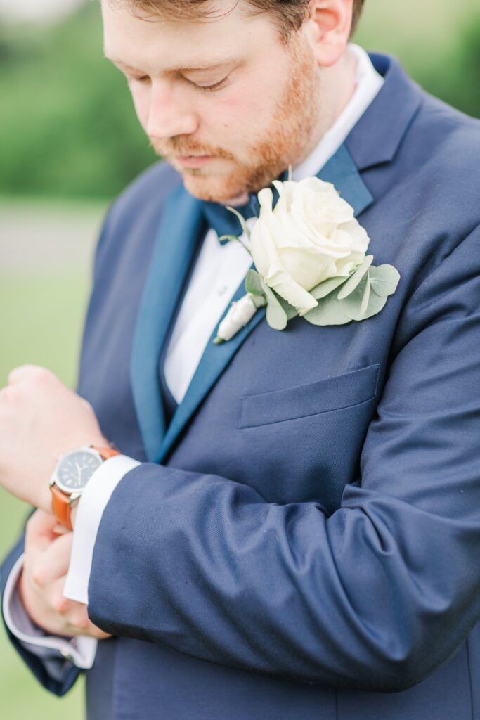 Groom Portrait at the White Dove Barn