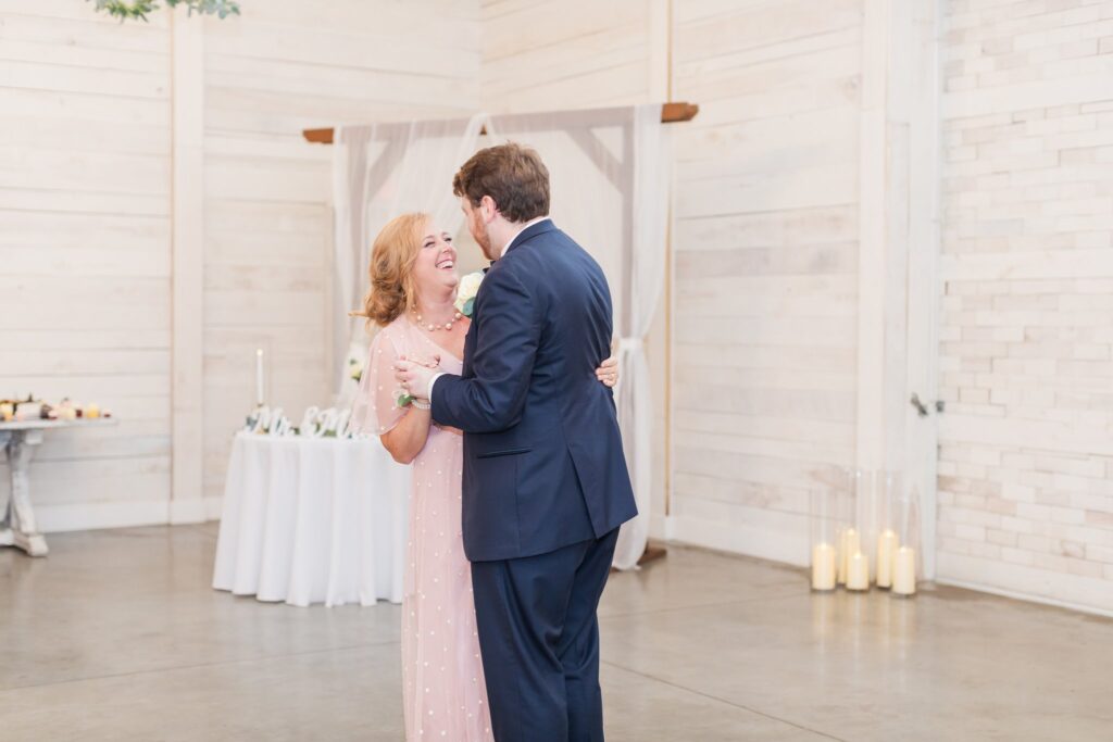 Mother and son dancing their special dance together at the White Dove Barn