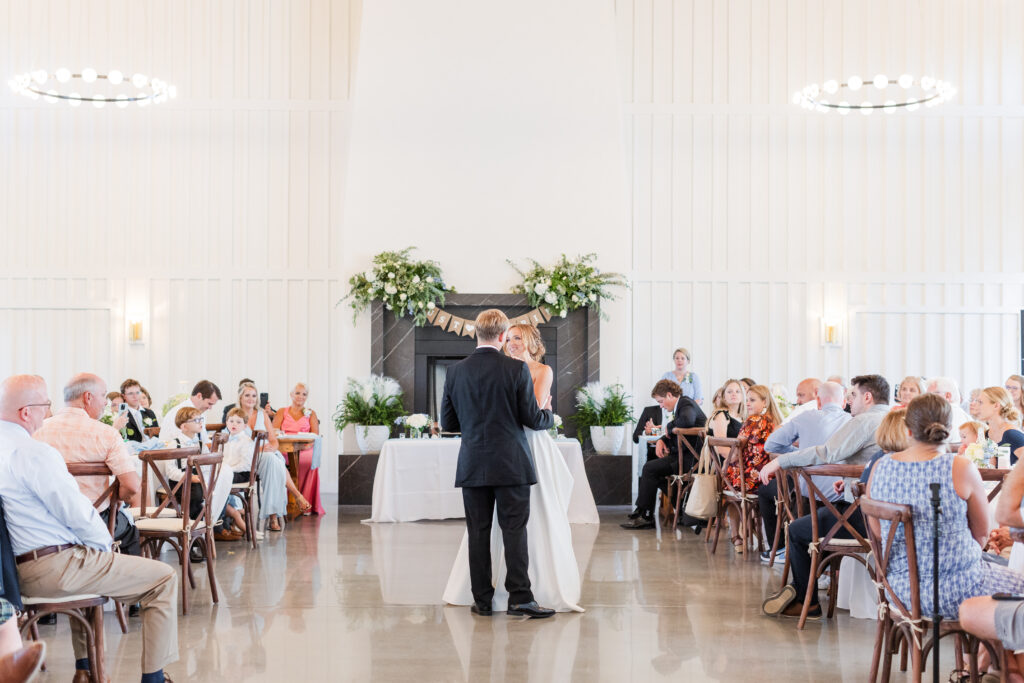 Bride and groom dancing on their wedding day inside the reception space at Spring Grove Ranch